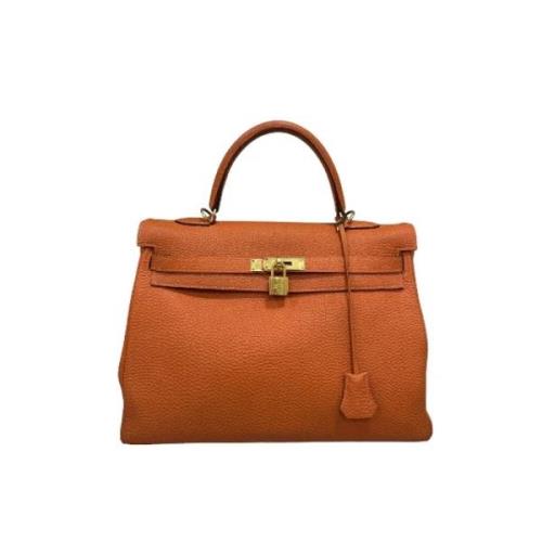 Pre-owned Oransje Hermès Kelly i skinn