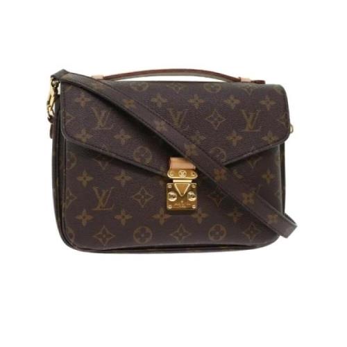 Pre-owned Brunt lerret Louis Vuitton veske