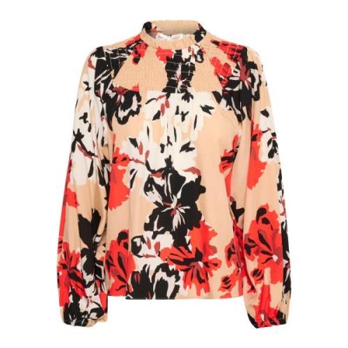 Bluse med smockdetaljer og blomsterprint