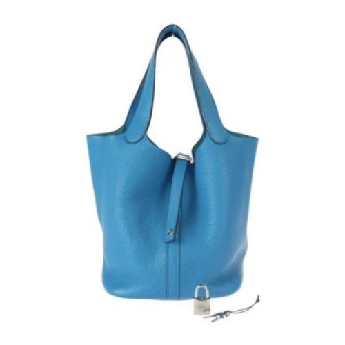 Pre-owned Fabric handbags