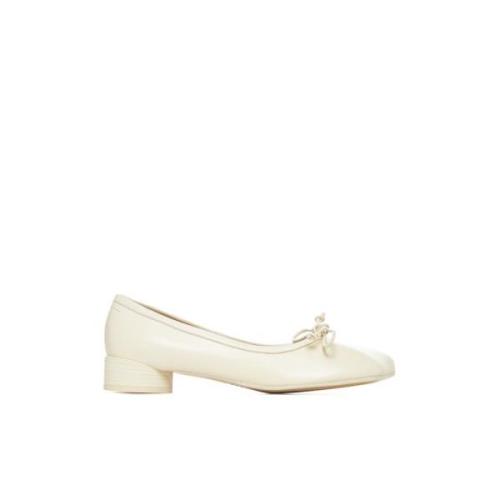 Ivory Skinn Ballet Flats