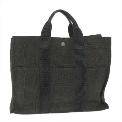 Pre-owned Canvas handbags