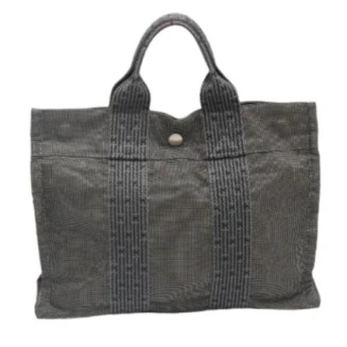 Pre-owned Canvas handbags